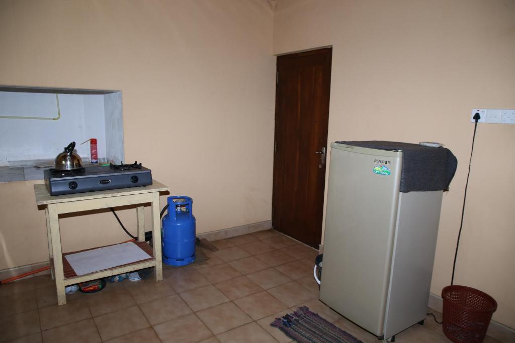 Kuchyň nebo kuchyňský kout v ubytování Shady Homestay