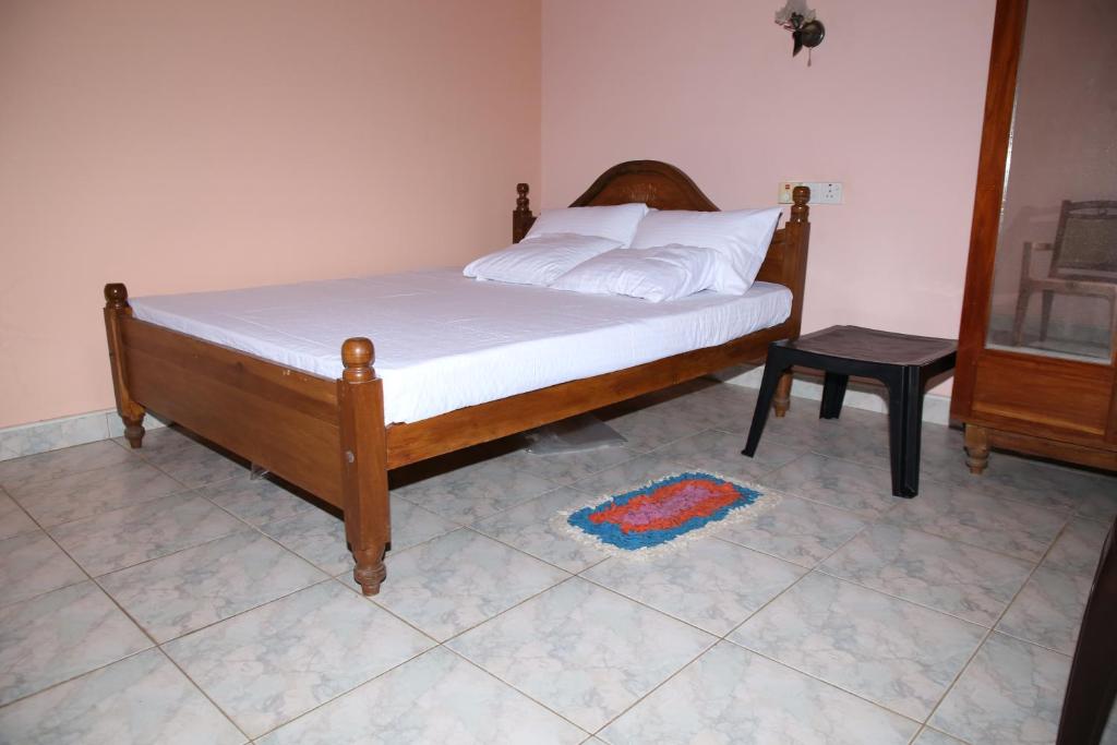 Postel nebo postele na pokoji v ubytování Shady Homestay