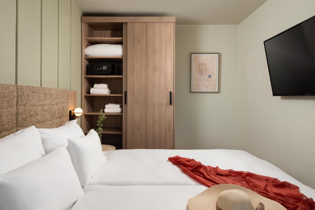 A bed or beds in a room at master Mirabell