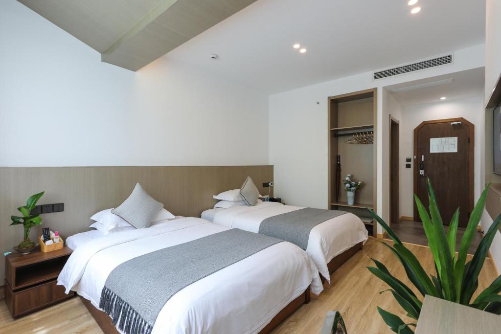 Postel nebo postele na pokoji v ubytování Wuzhen Residence B&B