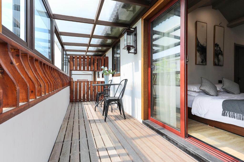 Balkón nebo terasa v ubytování Wuzhen Residence B&B