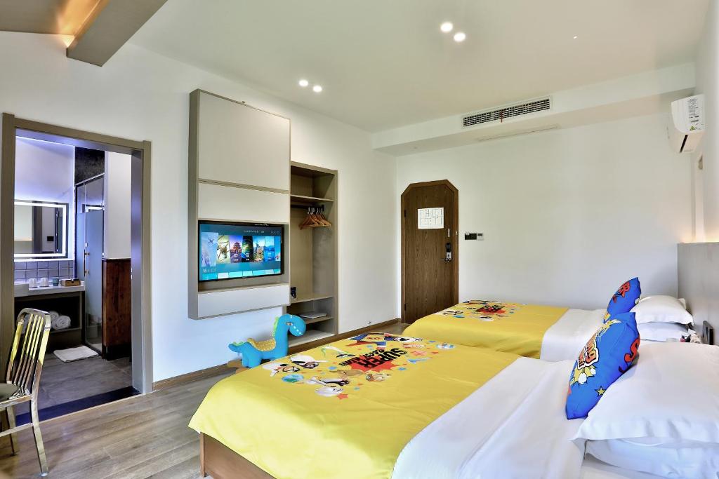 Postel nebo postele na pokoji v ubytování Wuzhen Residence B&B