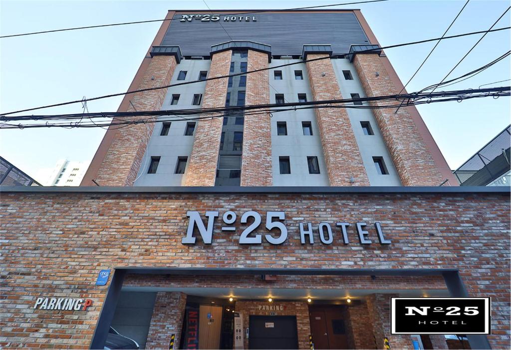 a building with a sign that reads n hotel at No25 Hotel Suyu in Seoul
