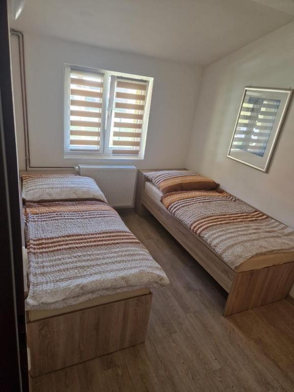Postel nebo postele na pokoji v ubytování Ubytování Louny