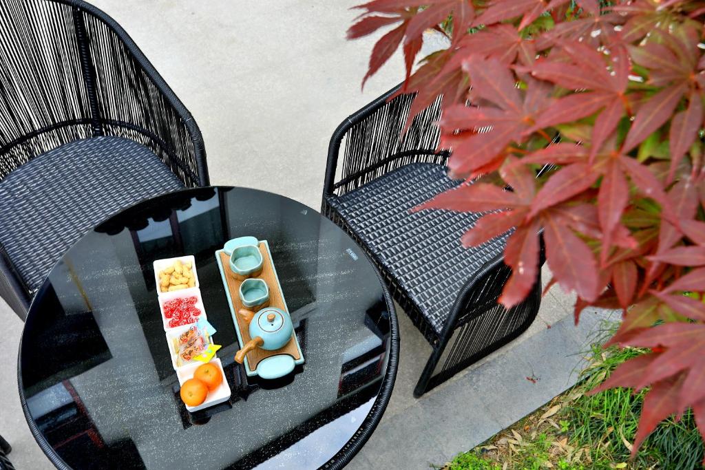 Posezení v ubytování Wuzhen Residence B&B