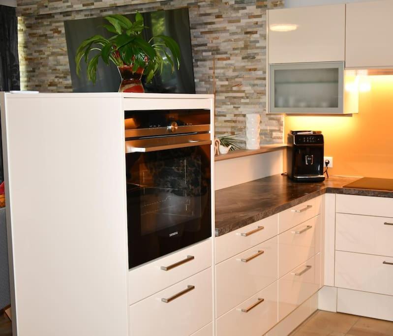 Kuchyň nebo kuchyňský kout v ubytování Apartment in Tulln an der Donau