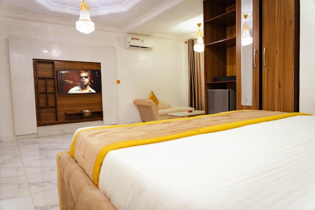 Postel nebo postele na pokoji v ubytování 247 Luxury Hotel