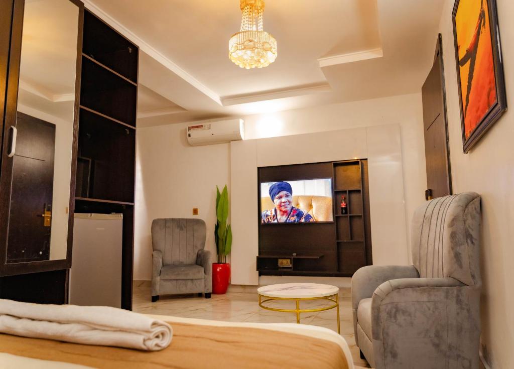 TV a/nebo společenská místnost v ubytování 247 Luxury Hotel