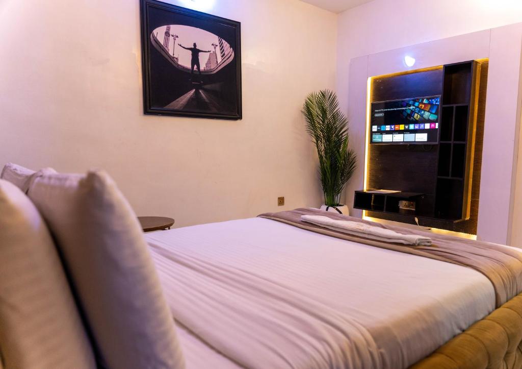 TV a/nebo společenská místnost v ubytování 247 Luxury Hotel