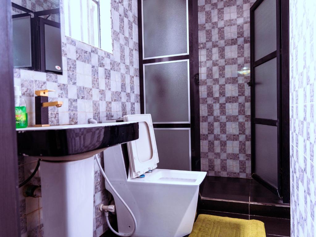 Koupelna v ubytování 247 Luxury Hotel