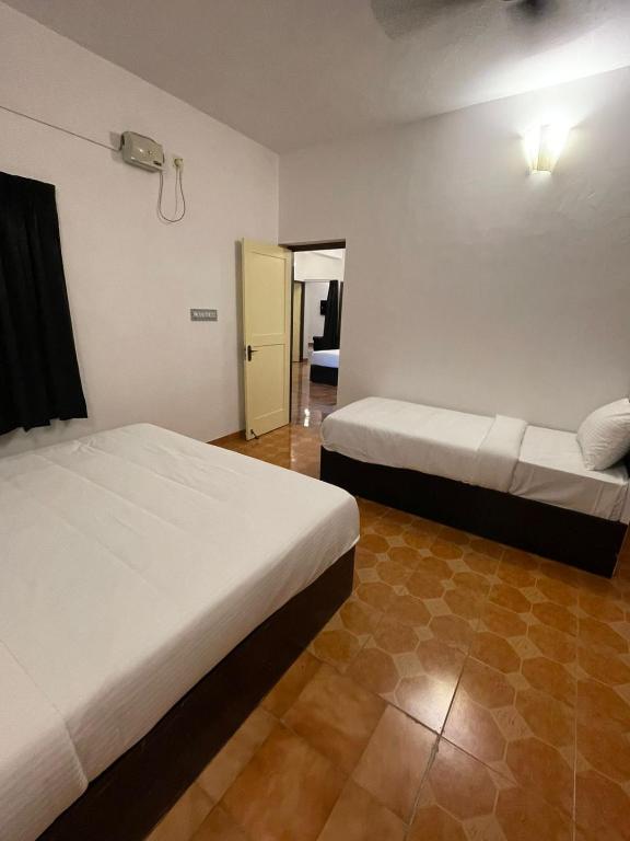 Postel nebo postele na pokoji v ubytování DAN The Villa