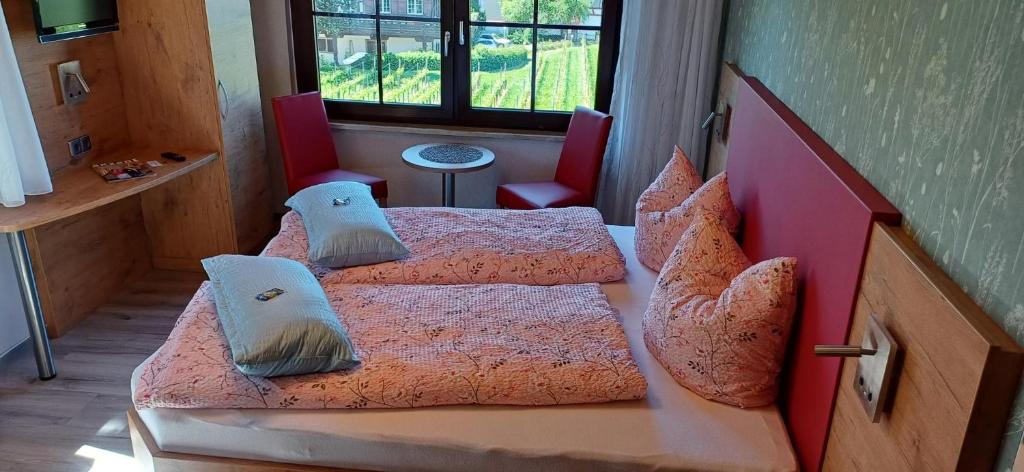 Postel nebo postele na pokoji v ubytování Gästehaus Ainser