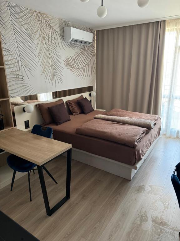 Giường trong phòng chung tại Sorrento Sole Mare Studio Appartment