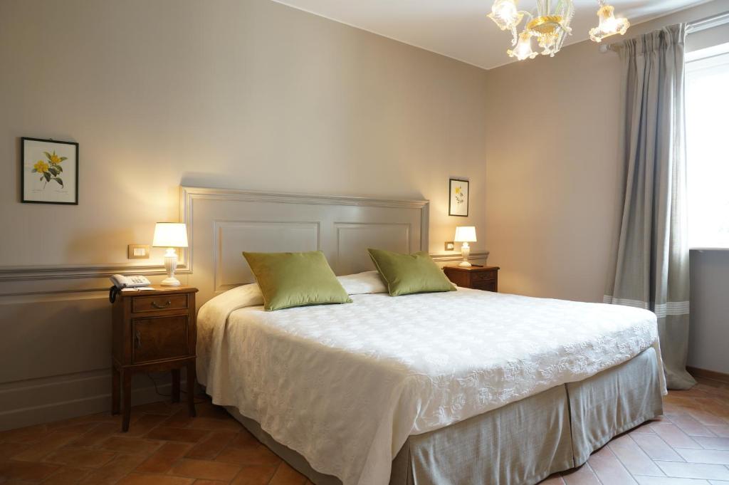 Postel nebo postele na pokoji v ubytování Villa Santa Barbara
