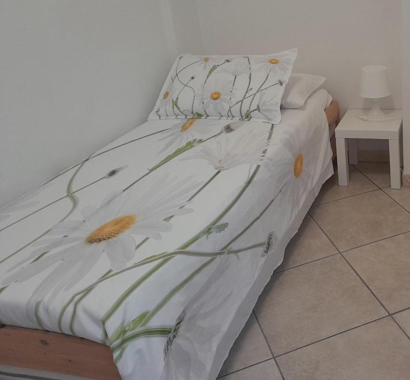 Postel nebo postele na pokoji v ubytování B&B Margherita