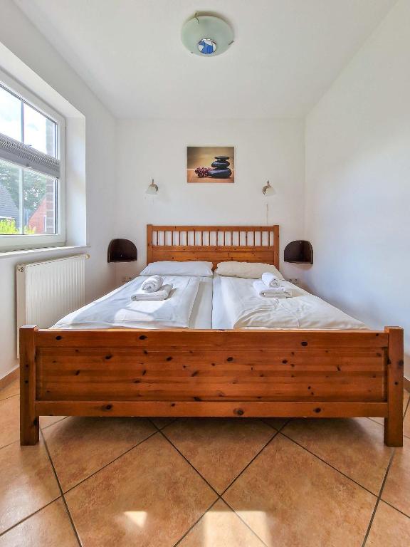 Postel nebo postele na pokoji v ubytování Krabbe
