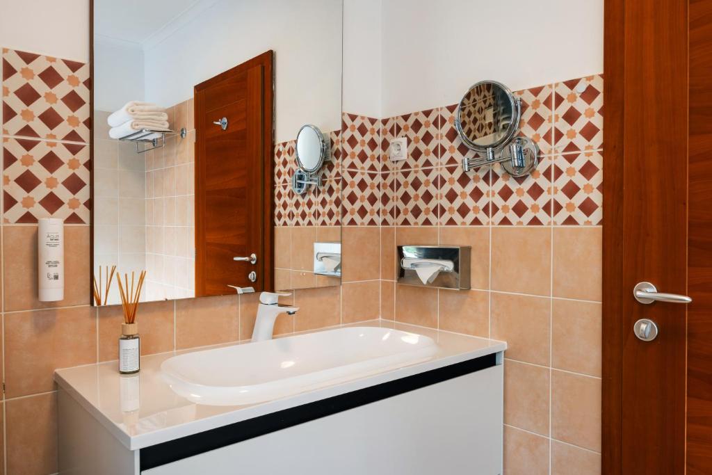 Koupelna v ubytování Hotel Lovec