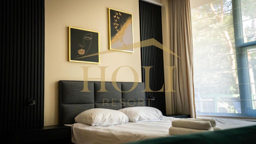 Postel nebo postele na pokoji v ubytování Holi Resort