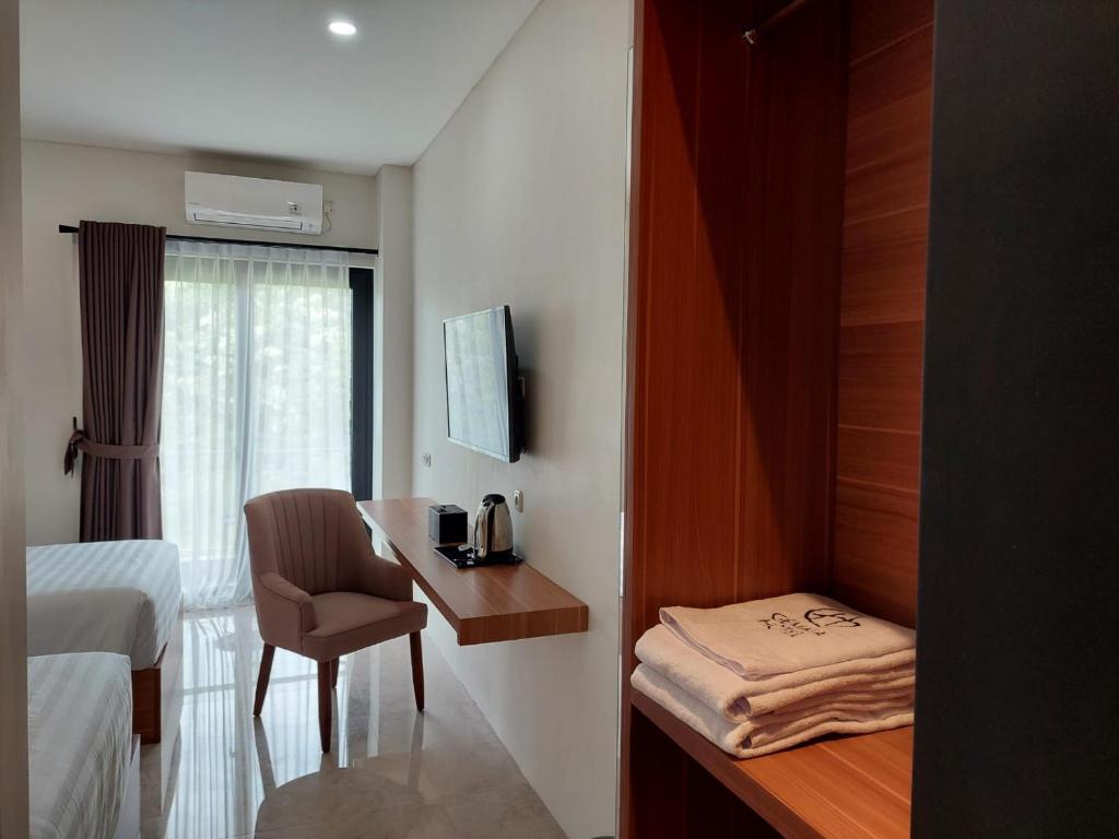 TV a/nebo společenská místnost v ubytování Gemma Hotel Balige