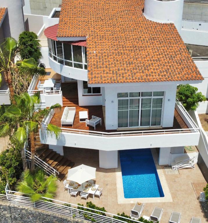 an aerial view of a house with an orange roof at Luxury Villa Taoro private heated pool Free Car Except Christmas in Adeje