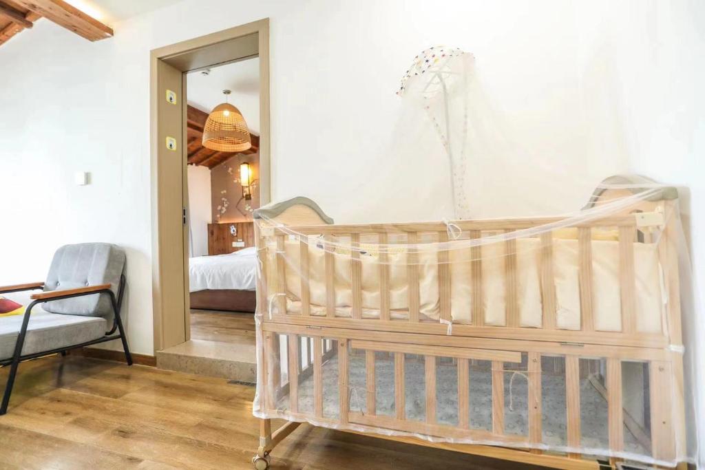 Postel nebo postele na pokoji v ubytování Wuzhen Residence B&B