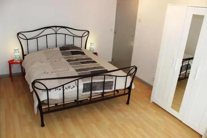 Postel nebo postele na pokoji v ubytování L'appart de Visé