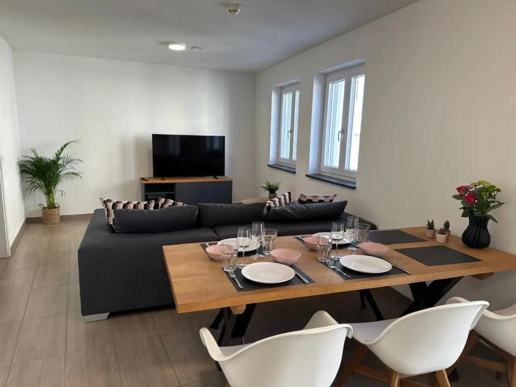 TV a/nebo společenská místnost v ubytování Wohnung 4 Rosenstraße