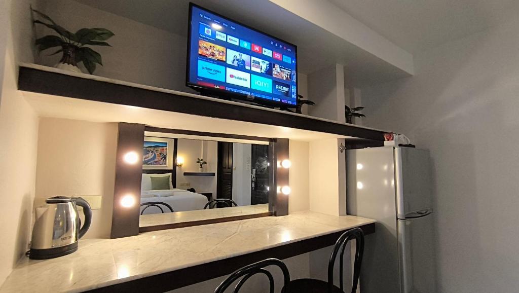 Kuchyň nebo kuchyňský kout v ubytování Paradise Inn