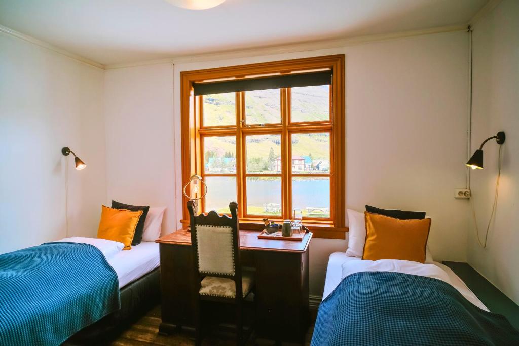 Postel nebo postele na pokoji v ubytování Snæfell - Hotel by Aldan