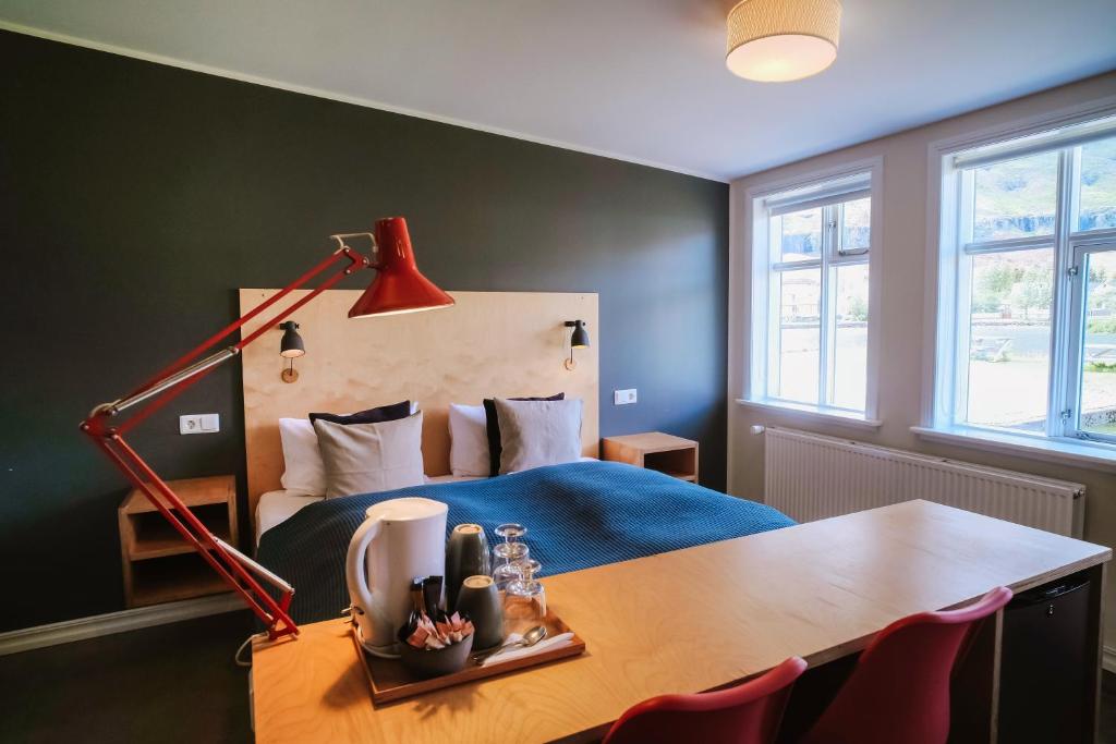 Postel nebo postele na pokoji v ubytování Snæfell - Hotel by Aldan