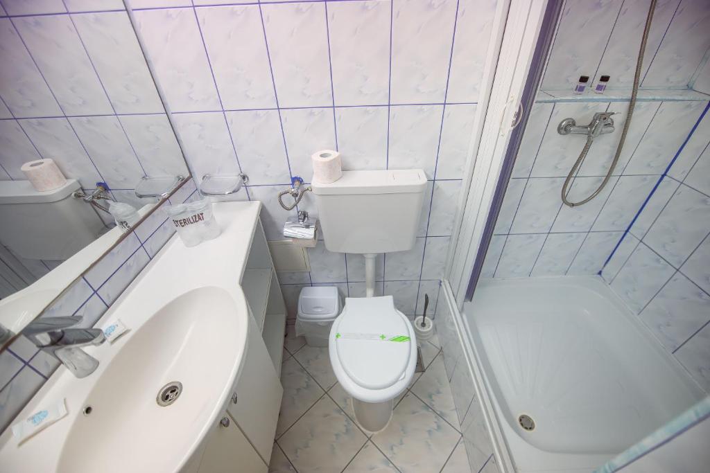 Koupelna v ubytování Hotel Doina