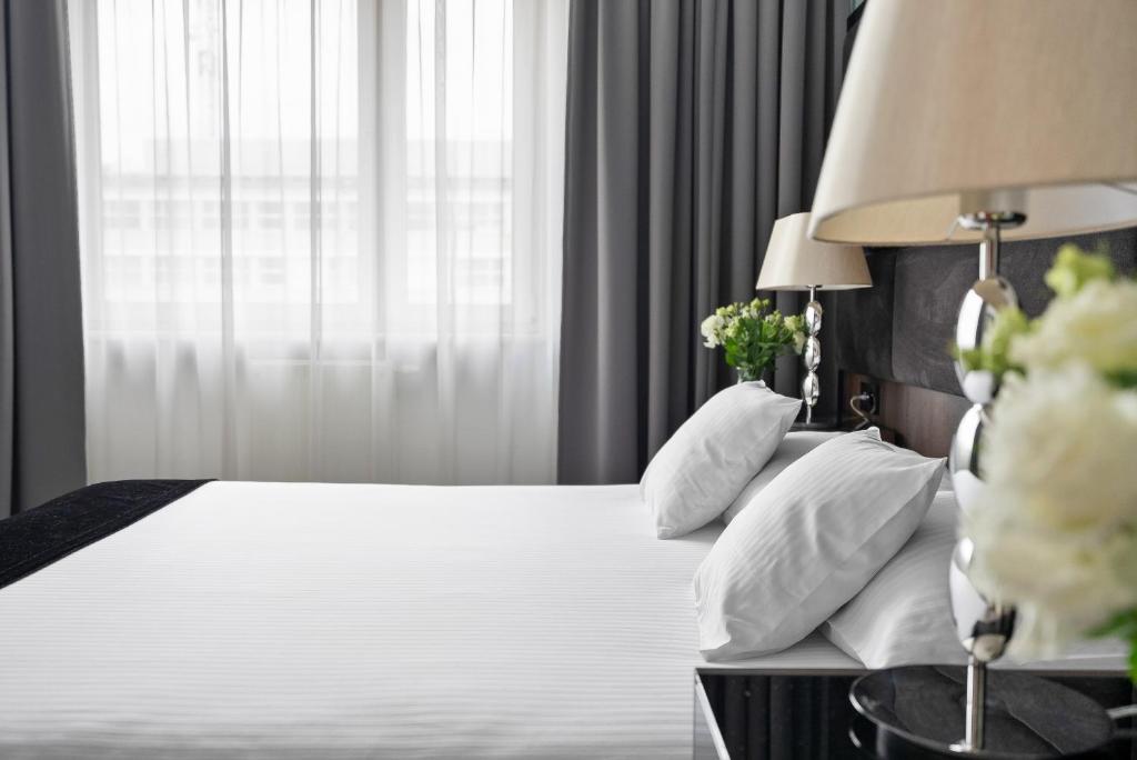 Posteľ alebo postele v izbe v ubytovaní Hotel Witkowski Warsaw Airport