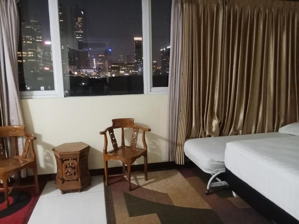 Letto o letti in una camera di Multi 88 Syariah