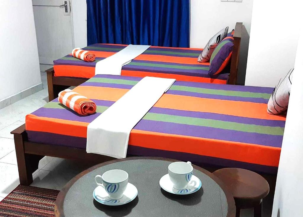 Postel nebo postele na pokoji v ubytování Lilly Rooms