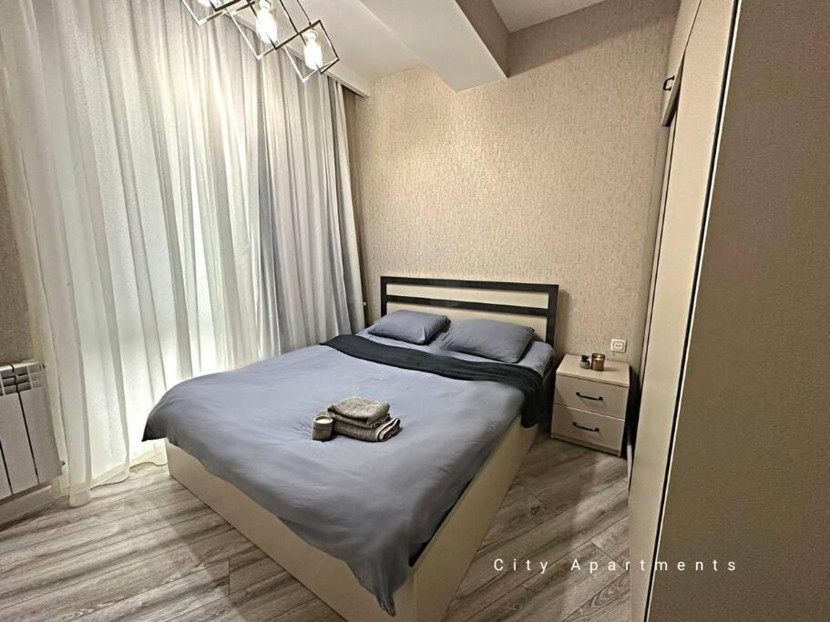 Krevet ili kreveti u jedinici u okviru objekta Grey Suite Apartment