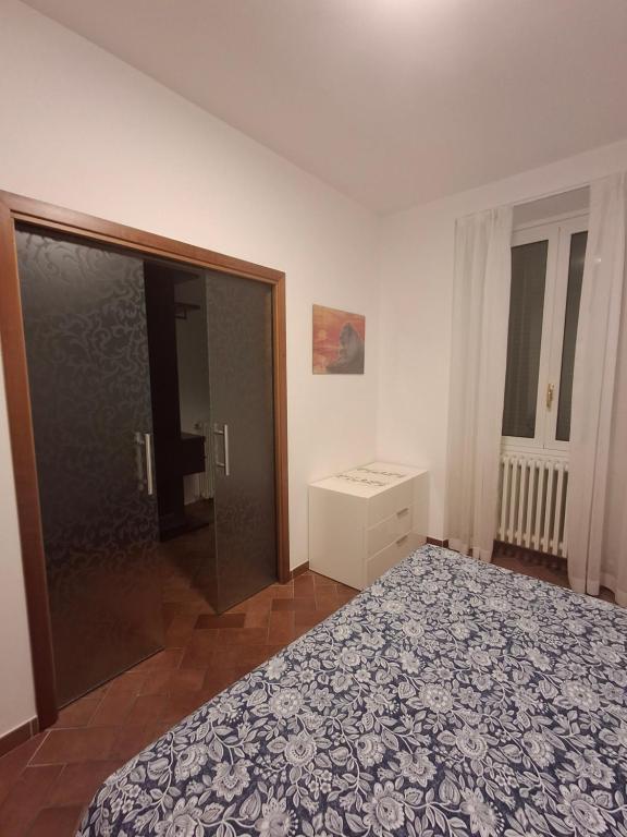 Postel nebo postele na pokoji v ubytování GIULIA e ANDREA