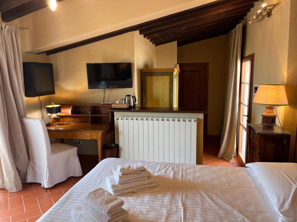 Postel nebo postele na pokoji v ubytování Fattoria Casagrande