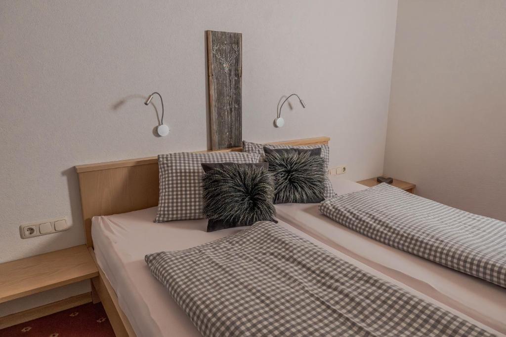 Ένα ή περισσότερα κρεβάτια σε δωμάτιο στο Haus Dorfblick