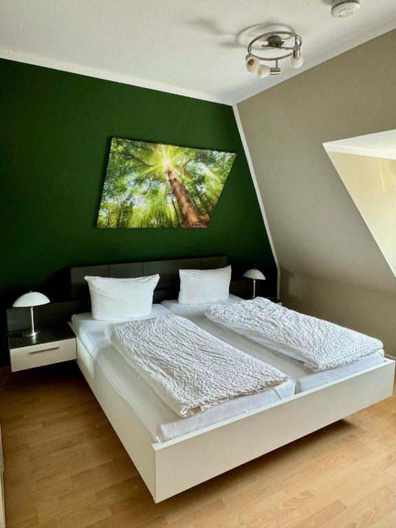 Postel nebo postele na pokoji v ubytování Hotel Sophien-Café