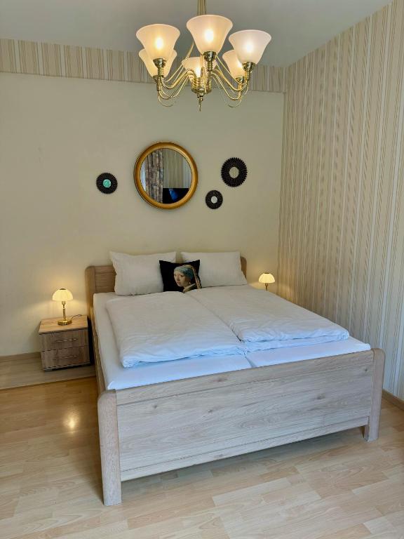 Postel nebo postele na pokoji v ubytování Hotel Sophien-Café