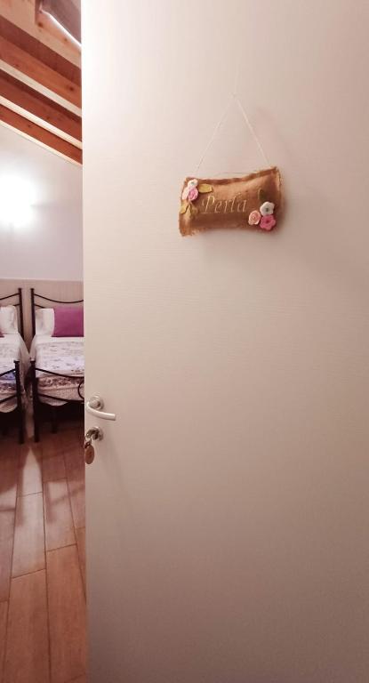 Cama o camas de una habitación en B&B Al sogno di Laura