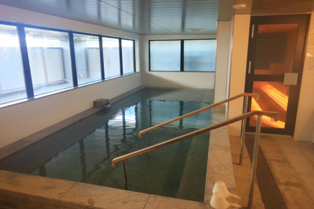 Bazén v ubytování ALA HOTEL KYOTO nebo v jeho okolí