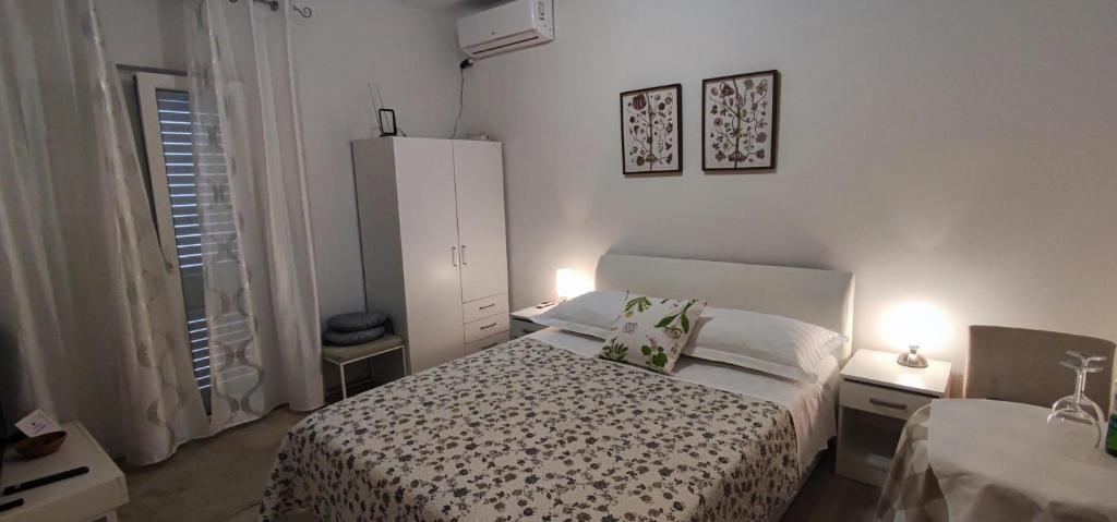 Posteľ alebo postele v izbe v ubytovaní Guest House Riverside