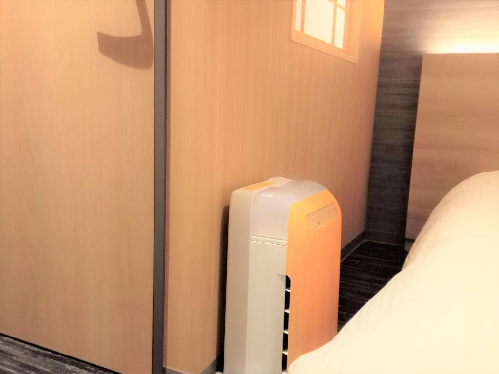 Postel nebo postele na pokoji v ubytování ALA HOTEL KYOTO