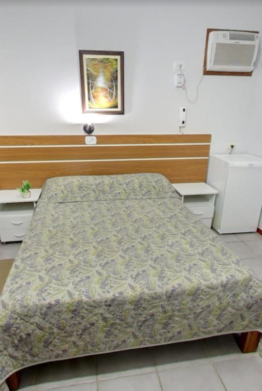 Postel nebo postele na pokoji v ubytování Hotel Xapuri
