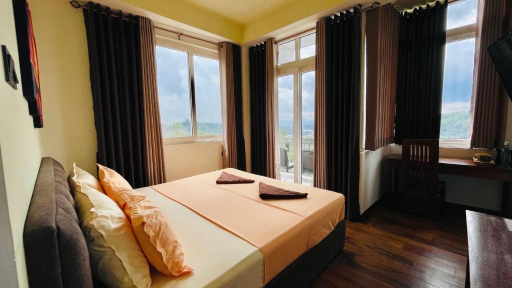 Postel nebo postele na pokoji v ubytování Sun Dove Suite