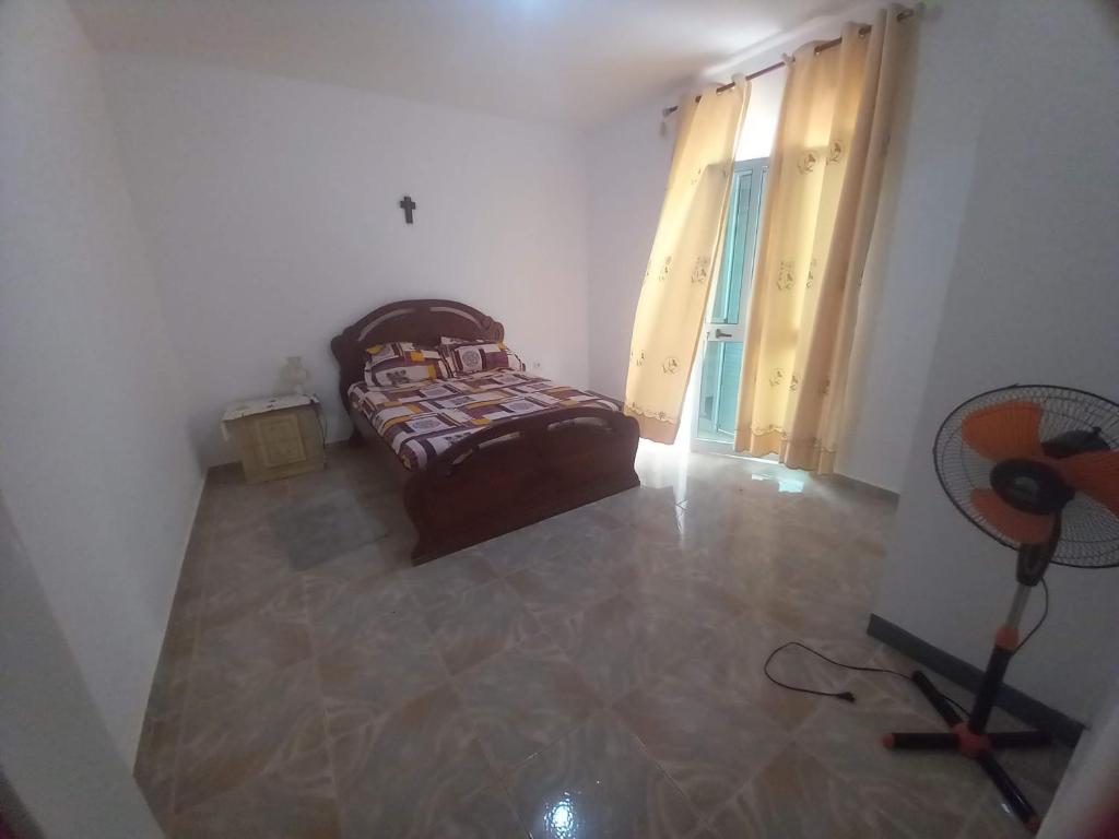 Postel nebo postele na pokoji v ubytování Casa Herminia