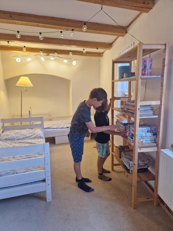 Postel nebo postele na pokoji v ubytování Dům s duší