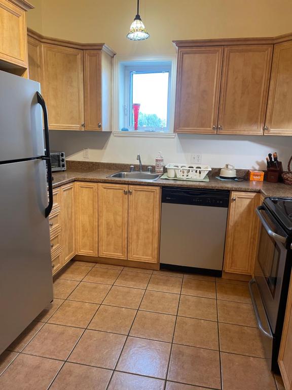 Kuchyň nebo kuchyňský kout v ubytování Auberge du Wagon