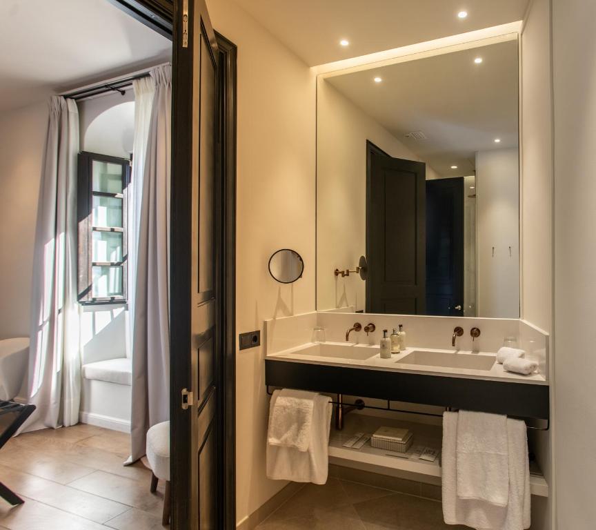 Koupelna v ubytování Hotel Boutique Sidonia